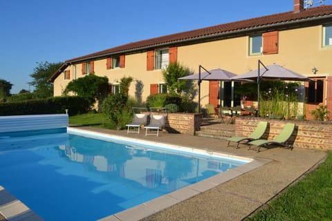 Swimming pool and back of house