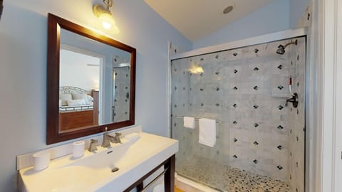 Combined shower/tub, hair dryer, towels, soap