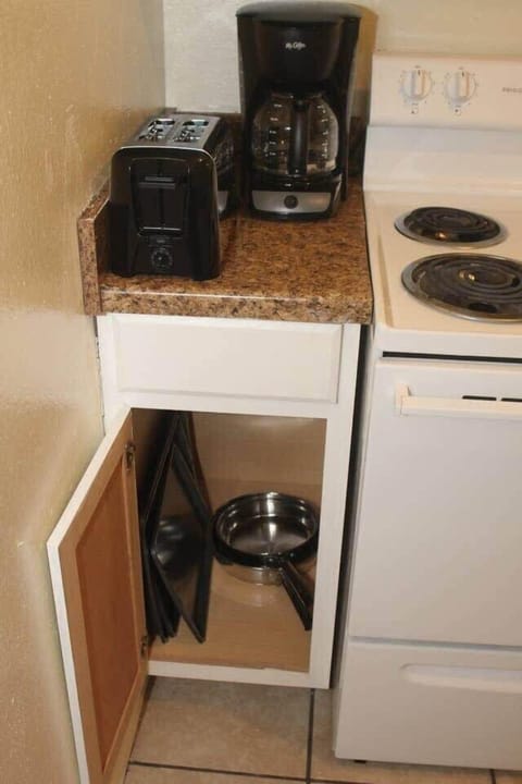 Microwave, oven, coffee/tea maker, cookware/dishes/utensils