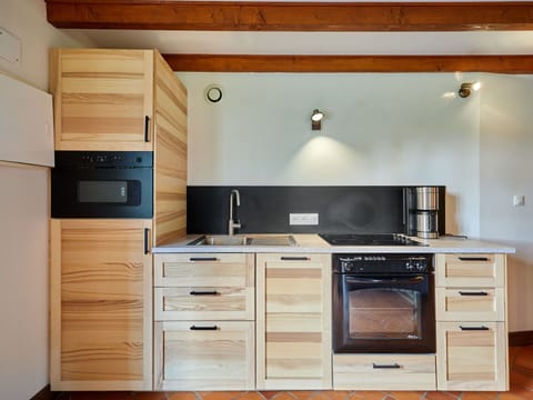 Countertop, Cabinetry, Property, Furniture, Building, Drawer, Kitchen Appliance, Kitchen Stove, Kitchen, Home Appliance