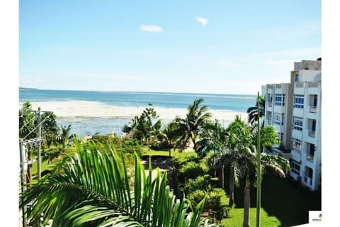 On the beach, sun loungers, beach towels