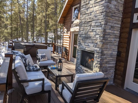Large deck with outdoor gas fireplace for relaxing