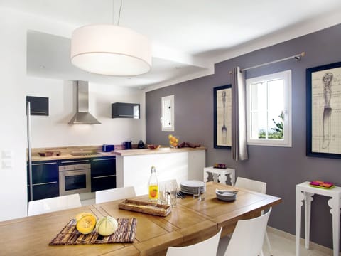 Table, Property, Furniture, Cabinetry, Wood, Tableware, Window, Interior Design, Lighting, Flooring