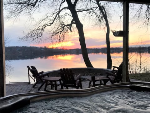 Hot tub view of fire pit and lake