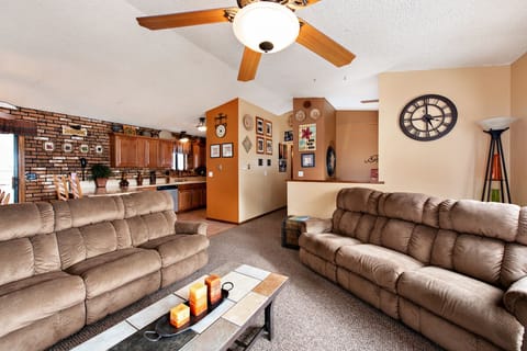 Living room looking into kitchen (ceiling fan in living room is not functional)