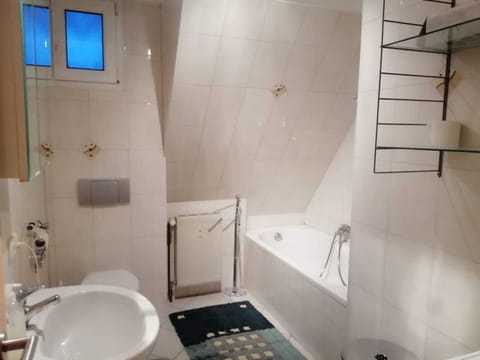 Combined shower/tub, hair dryer, towels, soap