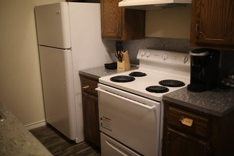 Microwave, oven, coffee/tea maker, cookware/dishes/utensils