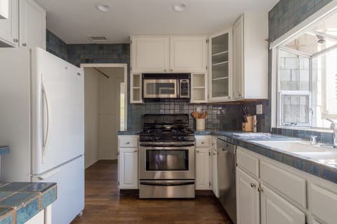 Kitchen features modern appliances.