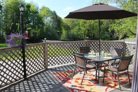 Back porch is a large deck where you can grill & enjoy the warm Maine summer.