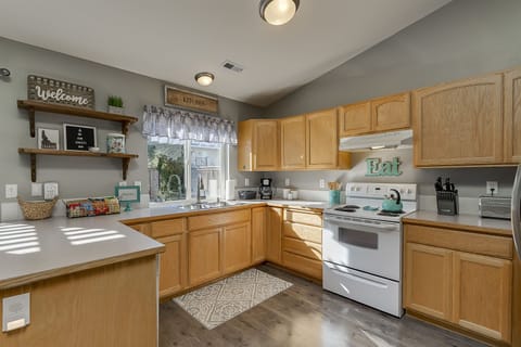 Kitchen stocked with all the amenities.