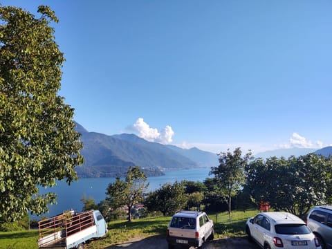 Sky, Cloud, Wheel, Plant, Vehicle, Car, Mountain, Tree