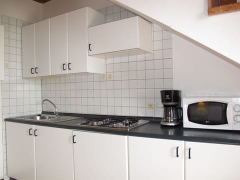 Cabinetry, Countertop, Furniture, Tap, Sink, Kitchen Sink, Kitchen Stove, Kitchen Appliance, Kitchen, Cooktop