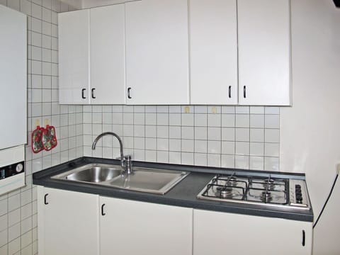 Kitchen Sink, Tap, Cabinetry, Sink, Countertop, Plumbing Fixture, Kitchen, Kitchen Stove, Flooring