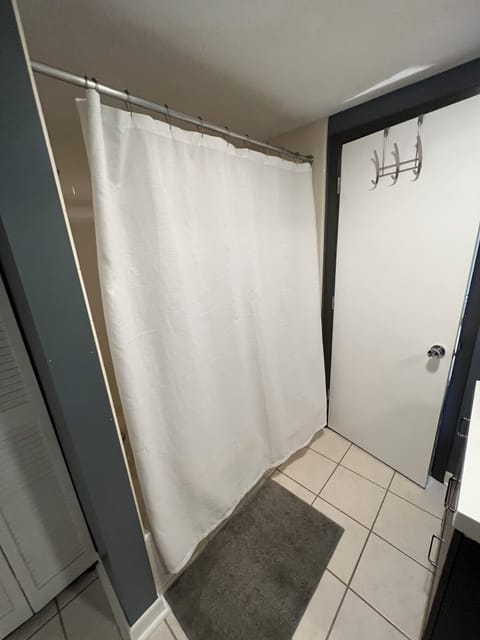 Combined shower/tub, hair dryer, towels, soap