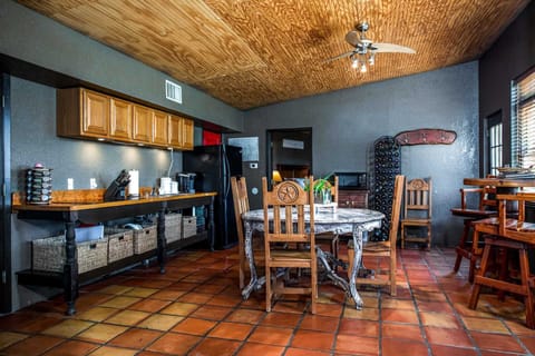 The open-floor setup of the kitchen and dining area assure that cooks and guests alike can visit freely and easily, even during meal preparation!