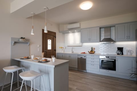 Armikes Beachfront  Suite 2 Afionas Corfu Kitchen And Dining Area