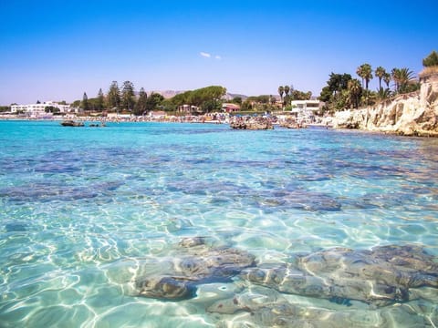 On the beach, sun loungers