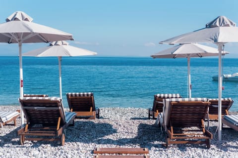 On the beach, sun loungers