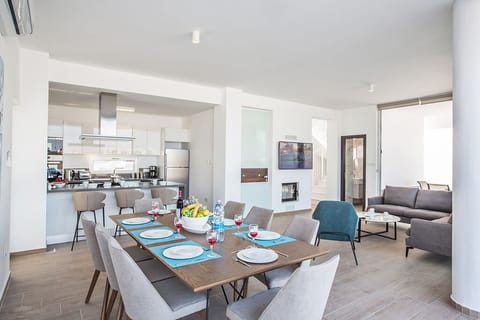 Dining Area with table and chairs to seat 8 persons