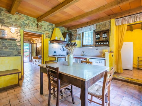 Table, Furniture, Cabinetry, Chair, Wood, Interior Design, Countertop, Floor, Flooring, Kitchen