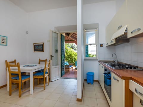 Furniture, Cabinetry, Sink, Kitchen Sink, Countertop, Wood, Kitchen Appliance, Kitchen Stove, Building, Table