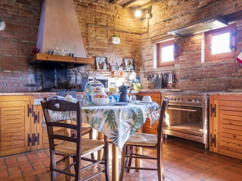 Furniture, Table, Wood, Lighting, Chair, Interior Design, Cabinetry, Kitchen, Countertop, Floor