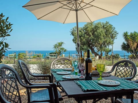 Umbrella, Property, Table, Furniture, Patio, Outdoor Table, Room, Real Estate, Shade, Leisure