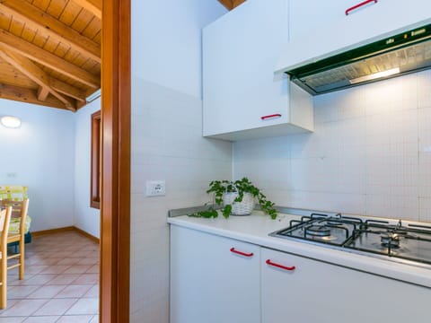 Furniture, Countertop, Cabinetry, Building, Kitchen Appliance, Wood, Flooring, Interior Design, Kitchen Stove, Floor