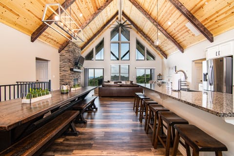 Large great room with gorgeous vaulted ceilings.