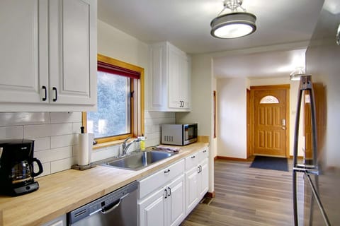 The beautiful kitchen has everything you need to make a meal in.