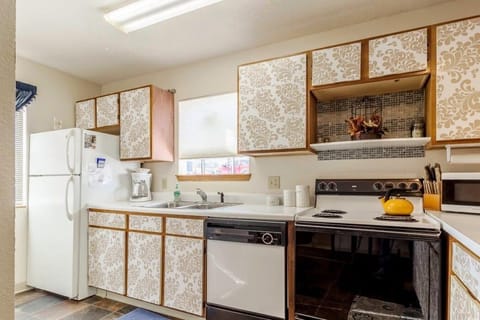 Kitchen equipped with full size Appliances.