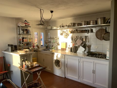 Fridge, stovetop, coffee/tea maker, electric kettle