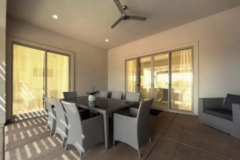 Covered patio with dining space