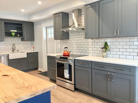 freshly renovated modern Kitchen with cabinets, countertops and appliances