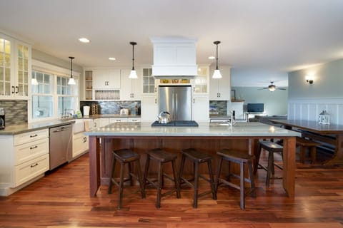 Kitchen with high end finishes and additional bar height seating