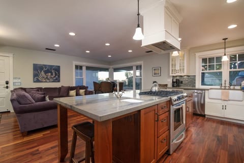 Large open living space in the front living and dining room open to the kitchen