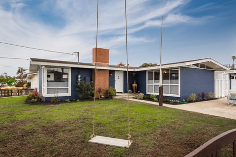 This lovely beach home is just down the street from the sand