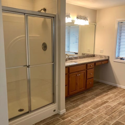 Bathtub, jetted tub, hair dryer, towels