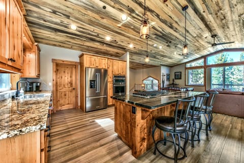 The kitchen island seats 5 and is perfect for visiting with the cook of the crew or preparing meals together