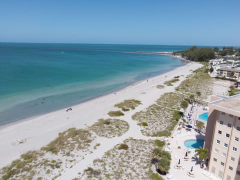 On the beach, sun loungers, beach towels