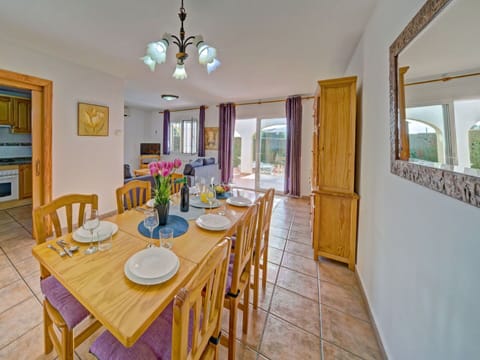 Table, Furniture, Property, Chair, Azure, Wood, Cabinetry, Interior Design, Lighting, Window