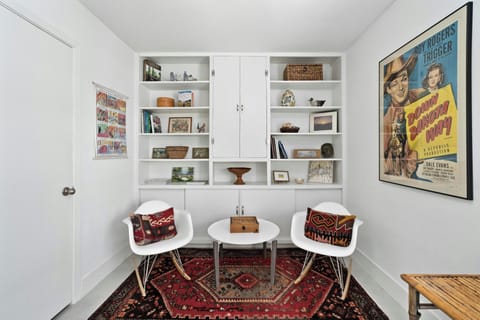 Office with storage, games, and books.