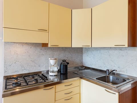 Cabinetry, Countertop, Property, Kitchen Sink, Sink, Kitchen Stove, Kitchen Appliance, Gas Stove, Cooktop, Kitchen