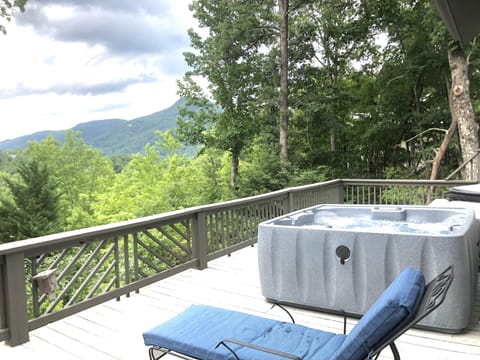 Amazing mountain views from the hot tube and lots of seating to relax.