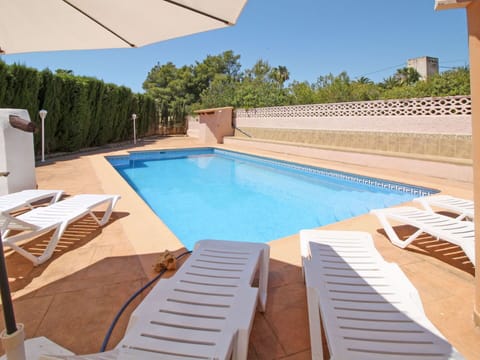 Water, Swimming Pool, Sky, Building, Plant, Azure, Shade, Outdoor Furniture, Interior Design, Rectangle