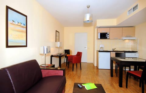 Kick back your feet and relax in the cozy living area.