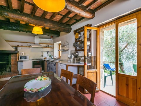 Furniture, Property, Table, Cabinetry, Chair, Wood, Interior Design, Lighting, Architecture, Yellow