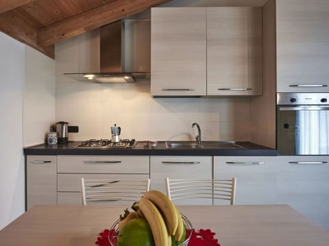 Cabinetry, Countertop, Property, Kitchen, Building, Kitchen Sink, Tap, Kitchen Stove, Kitchen Appliance