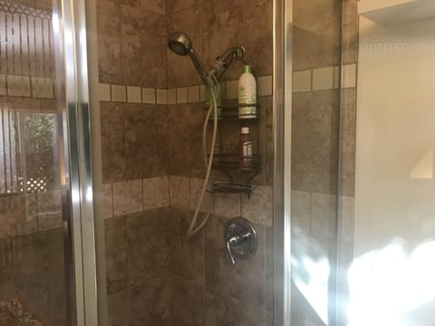 Shower, eco-friendly toiletries, hair dryer, towels