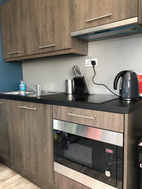 Fridge, microwave, stovetop, electric kettle